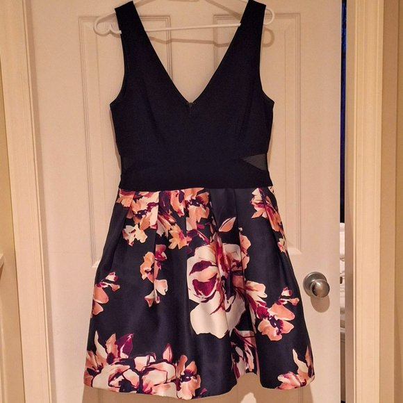 Navy Blue Tea Length Dress with Mesh Cut Outs and Floral Skirt - Picture 1 of 9